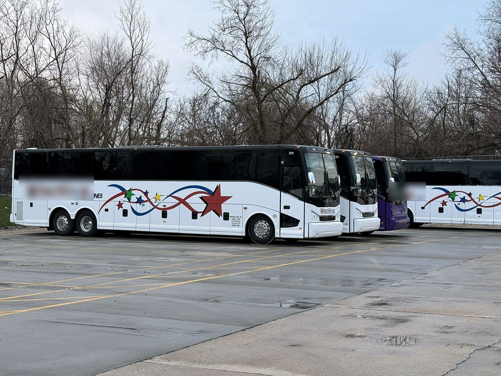 Row of motor coaches in a lot
