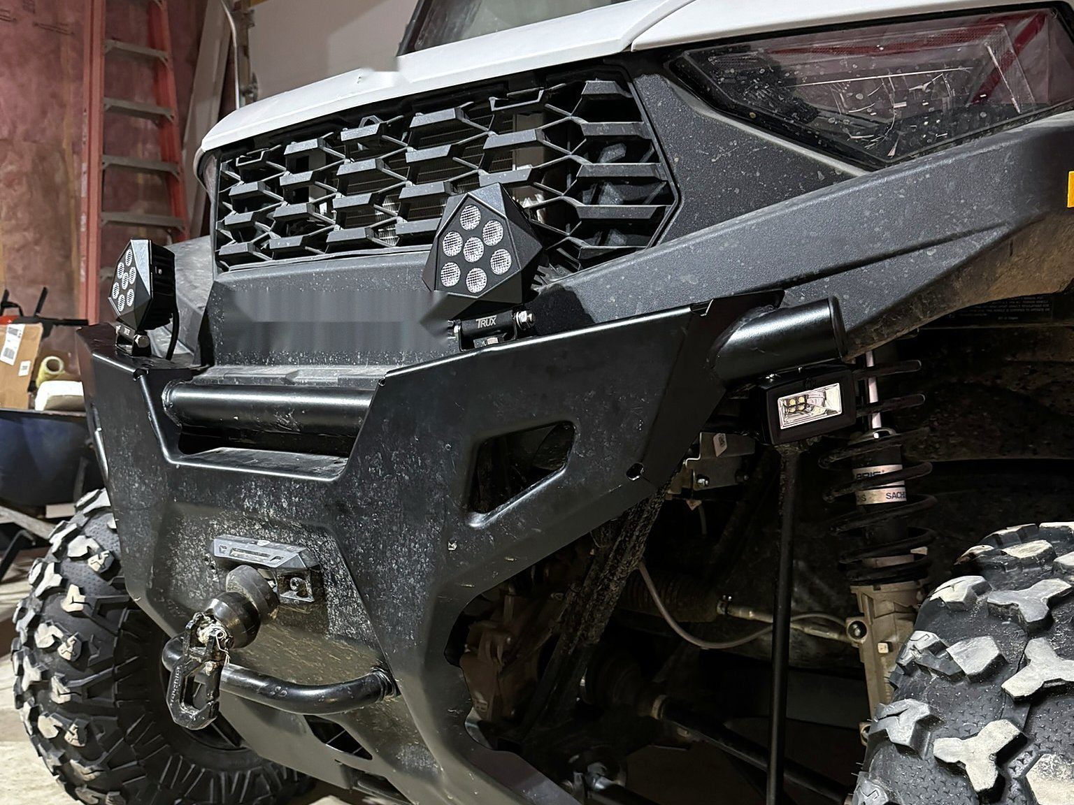 UTV front with auxiliary light pods installed