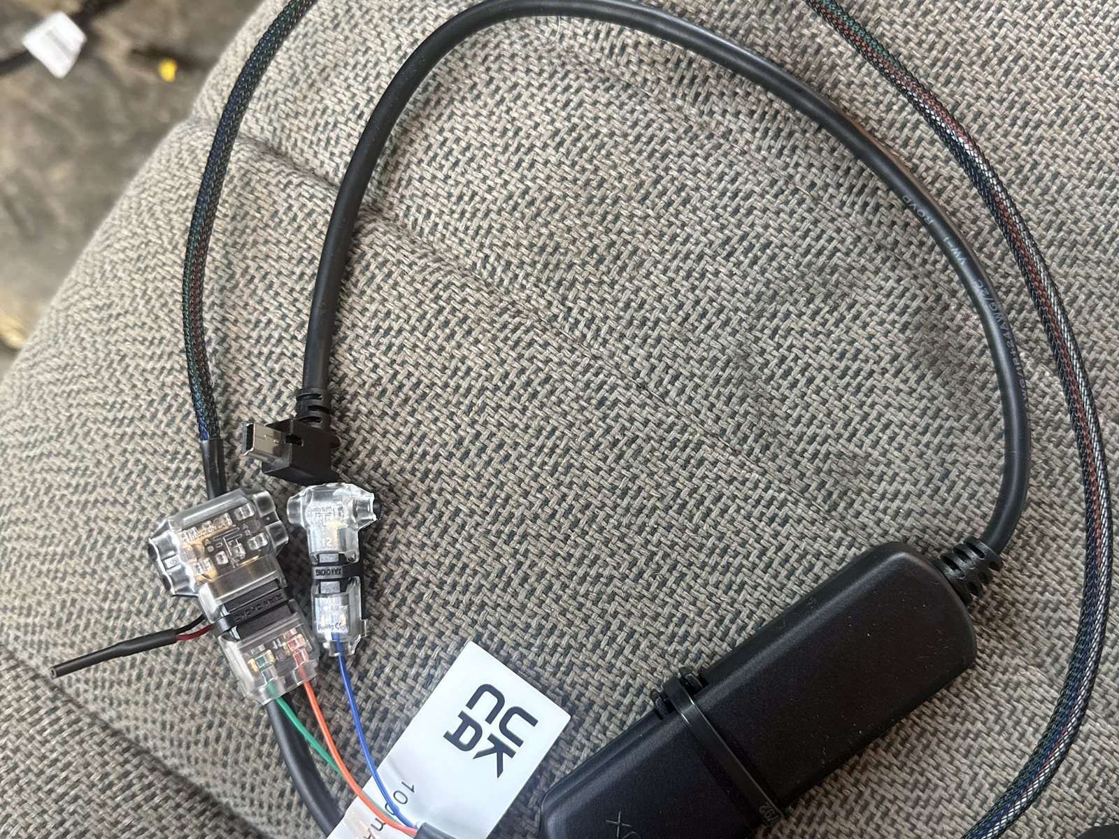 Geotab IOX add-on harness with braided sleeving and sealed tap connectors, ready to install