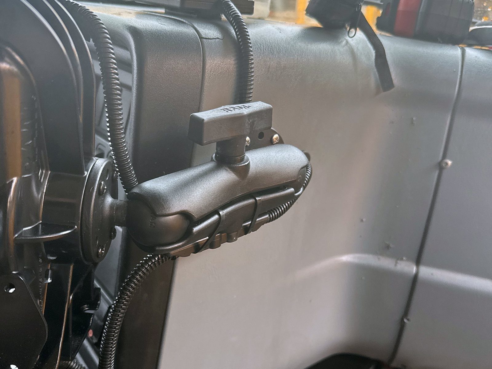 RAM tablet mount arm installed on a school bus dash