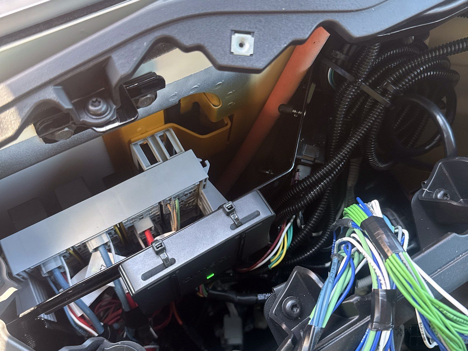 Organized wiring behind a dash panel